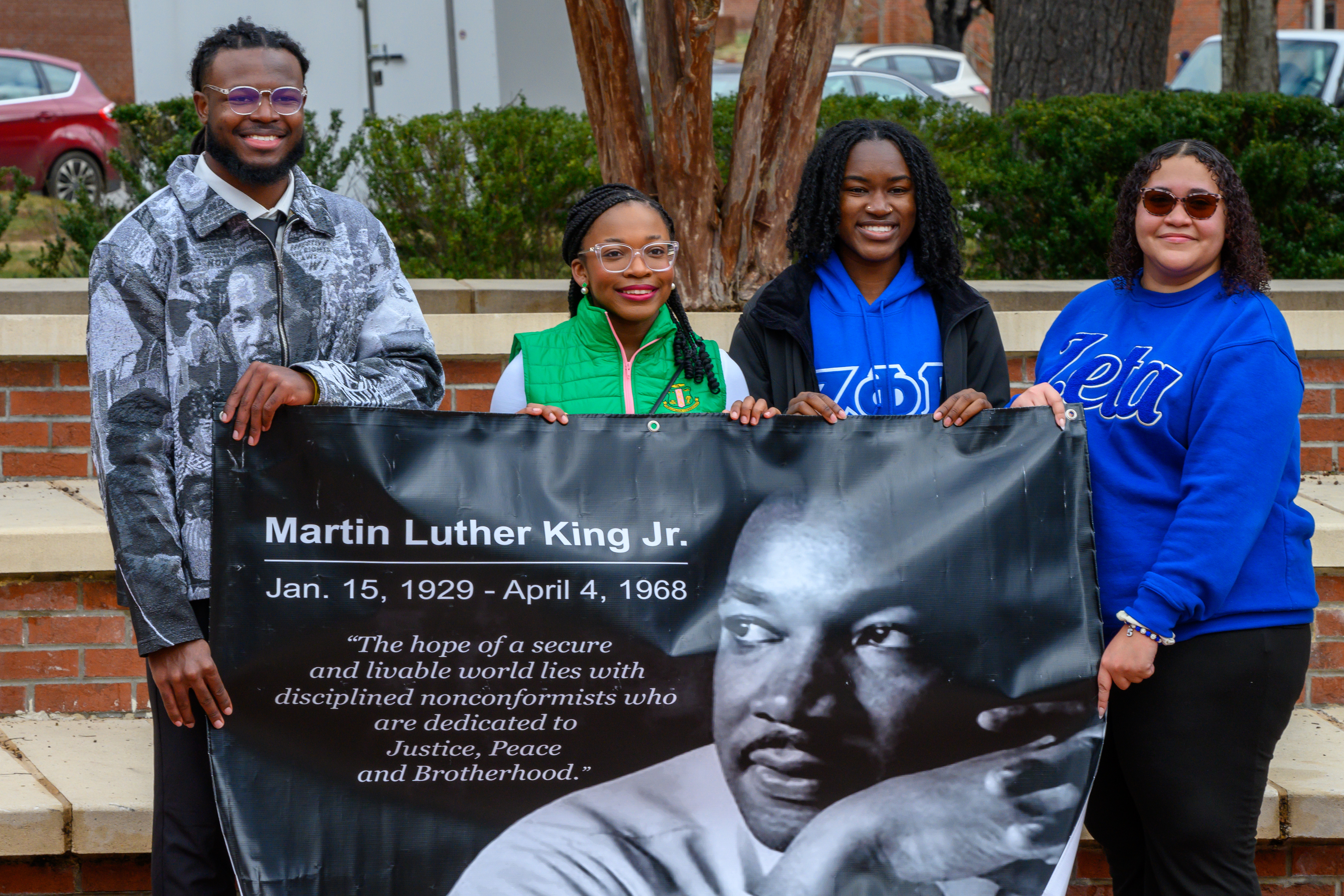 WCU students hold MLK banner during unity march