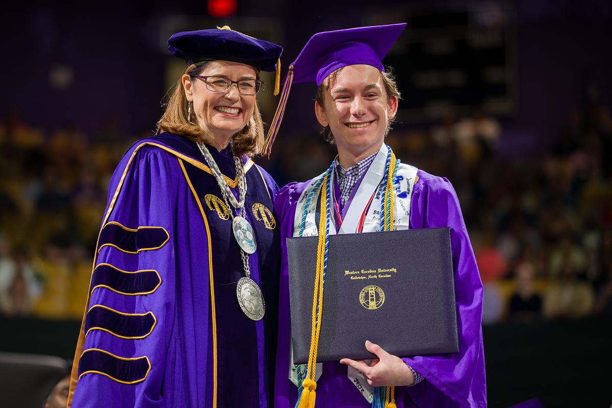 Chancellor Brown with Students at Commencement