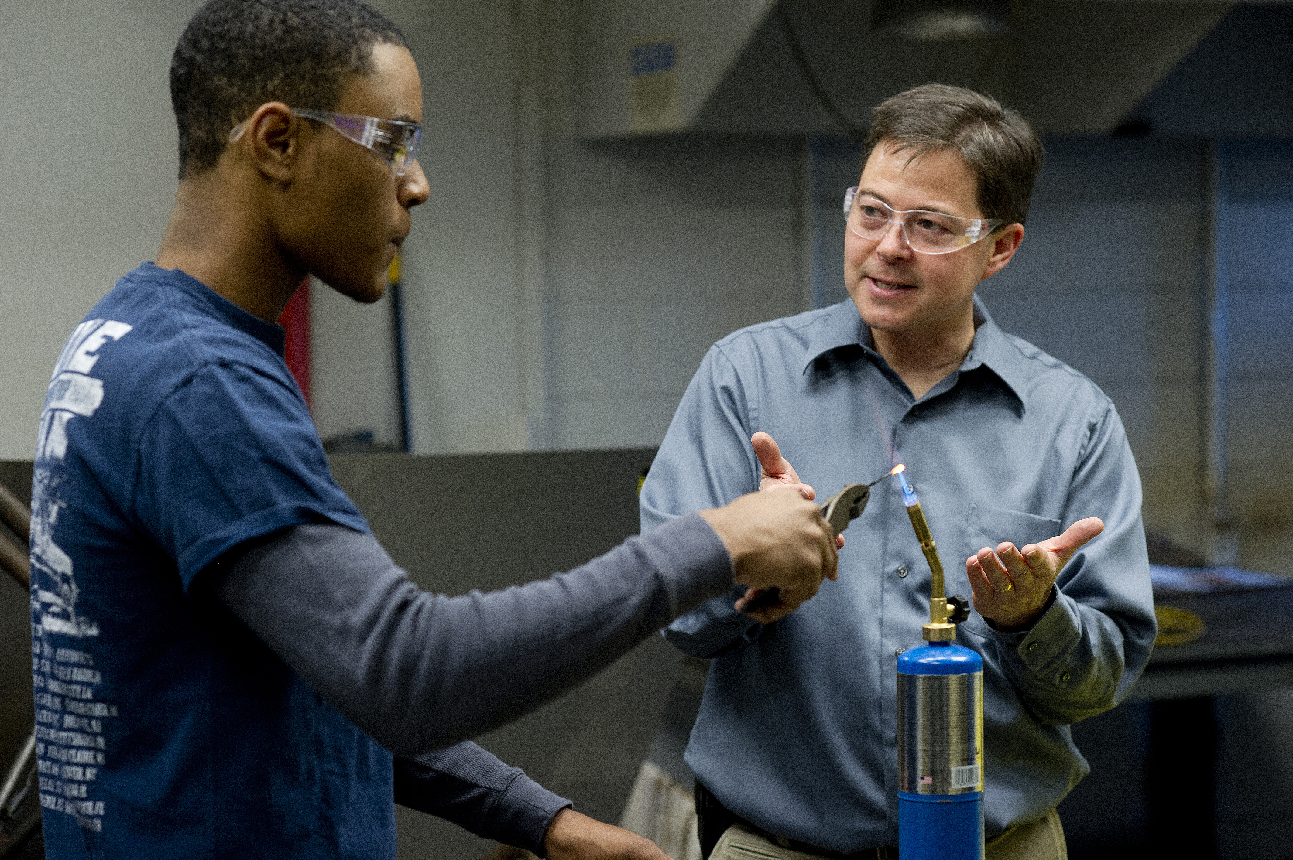 Martin Tanaka works with a student at WCU