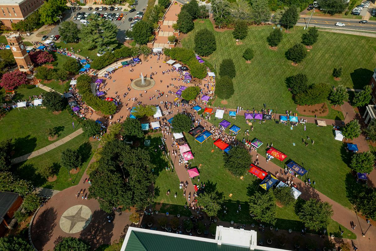 Aerial view of campus with tents setup across central campus