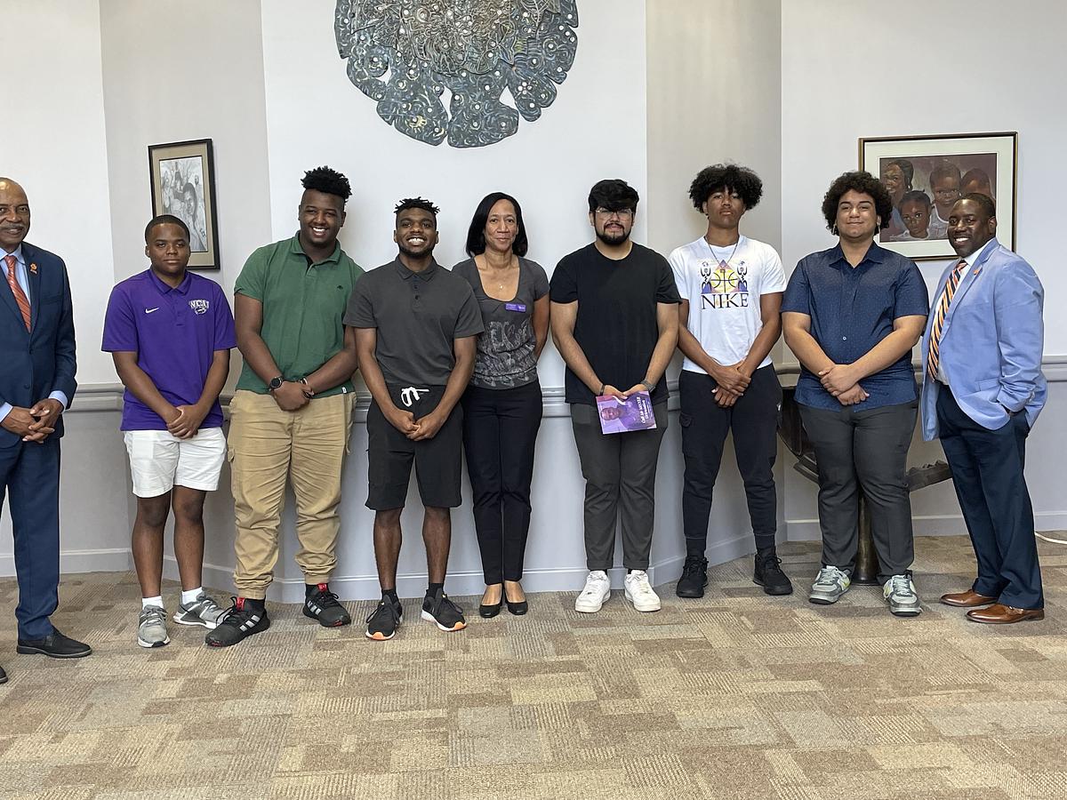 A group of Call Me Mister participants at their induction