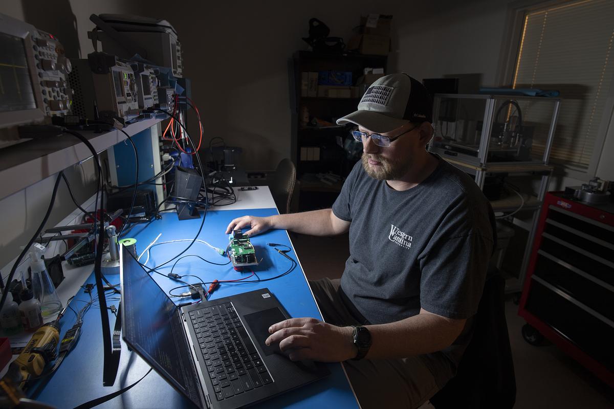 Shawn Lyvers tests equipment