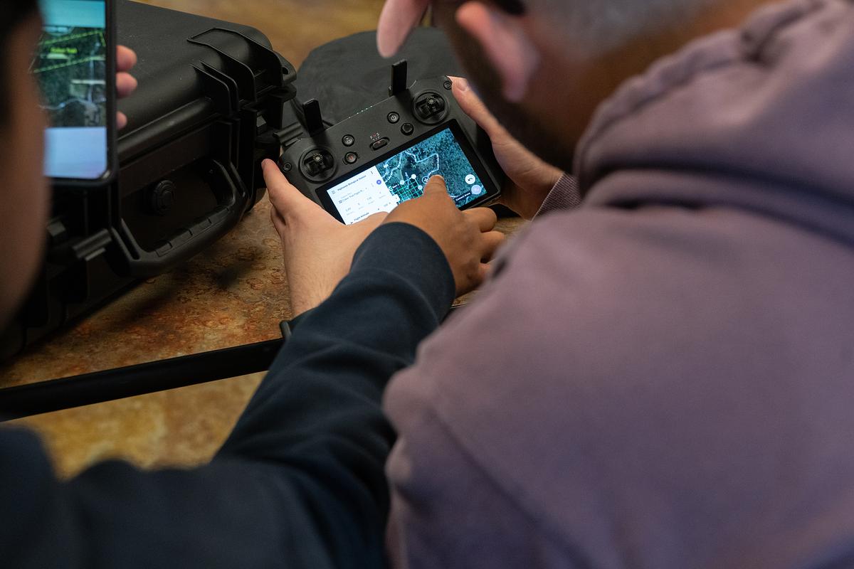 WCU Construction Management Students work with a faculty member to learn new technology