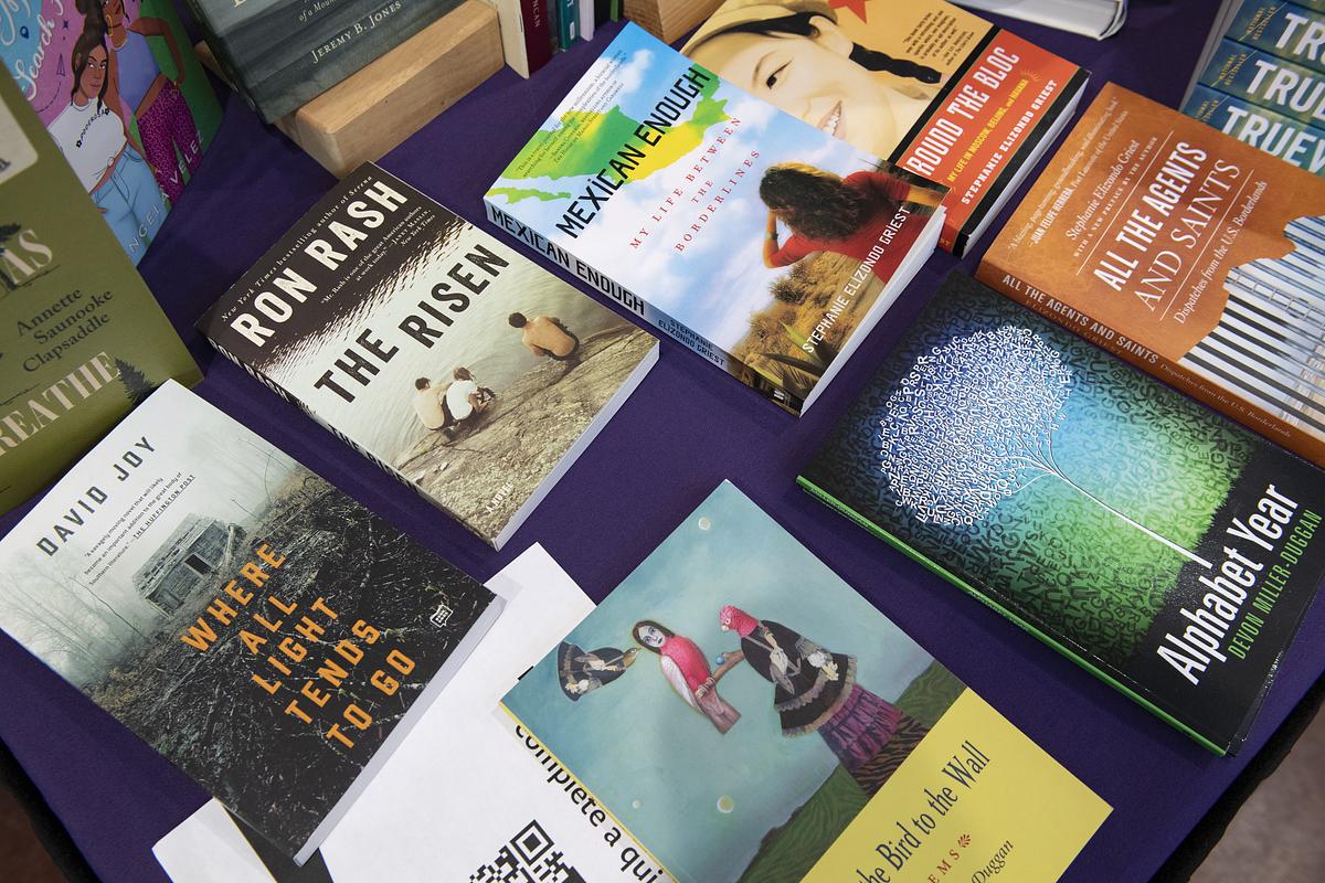 A variety of books on a table for display