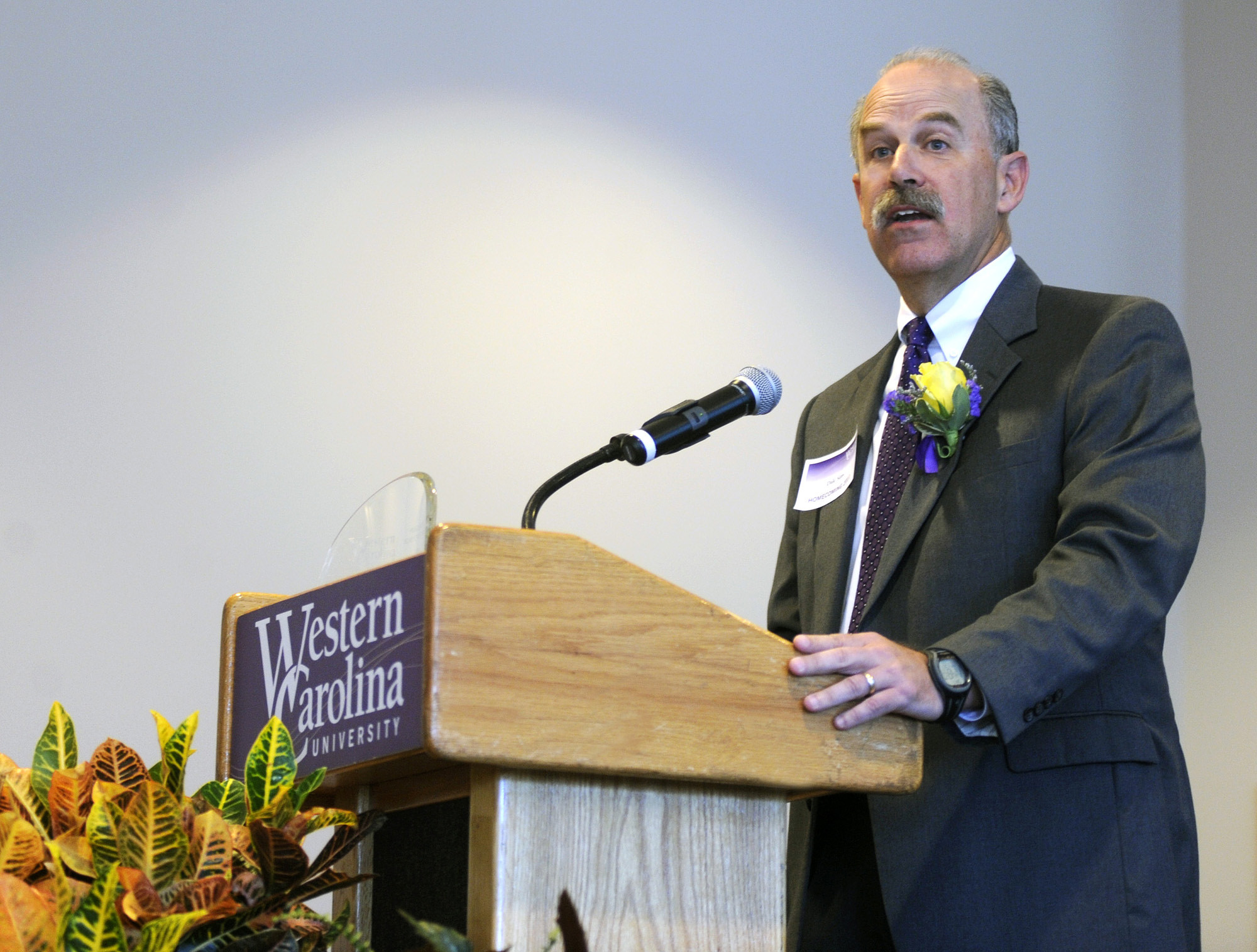 Dale Sims speaks at a homecoming event in 2011