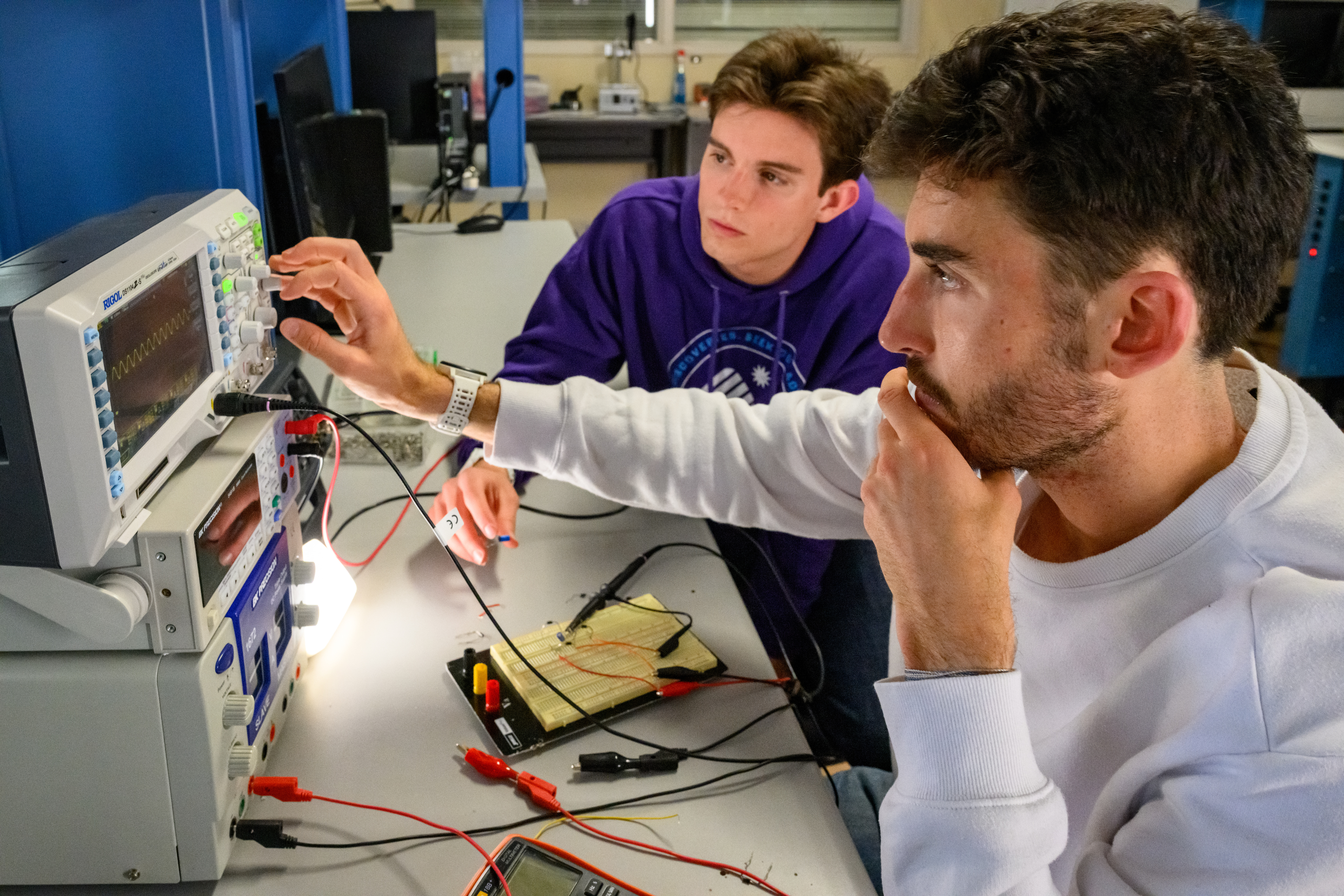 Photo of engineering students working on a project at WCU