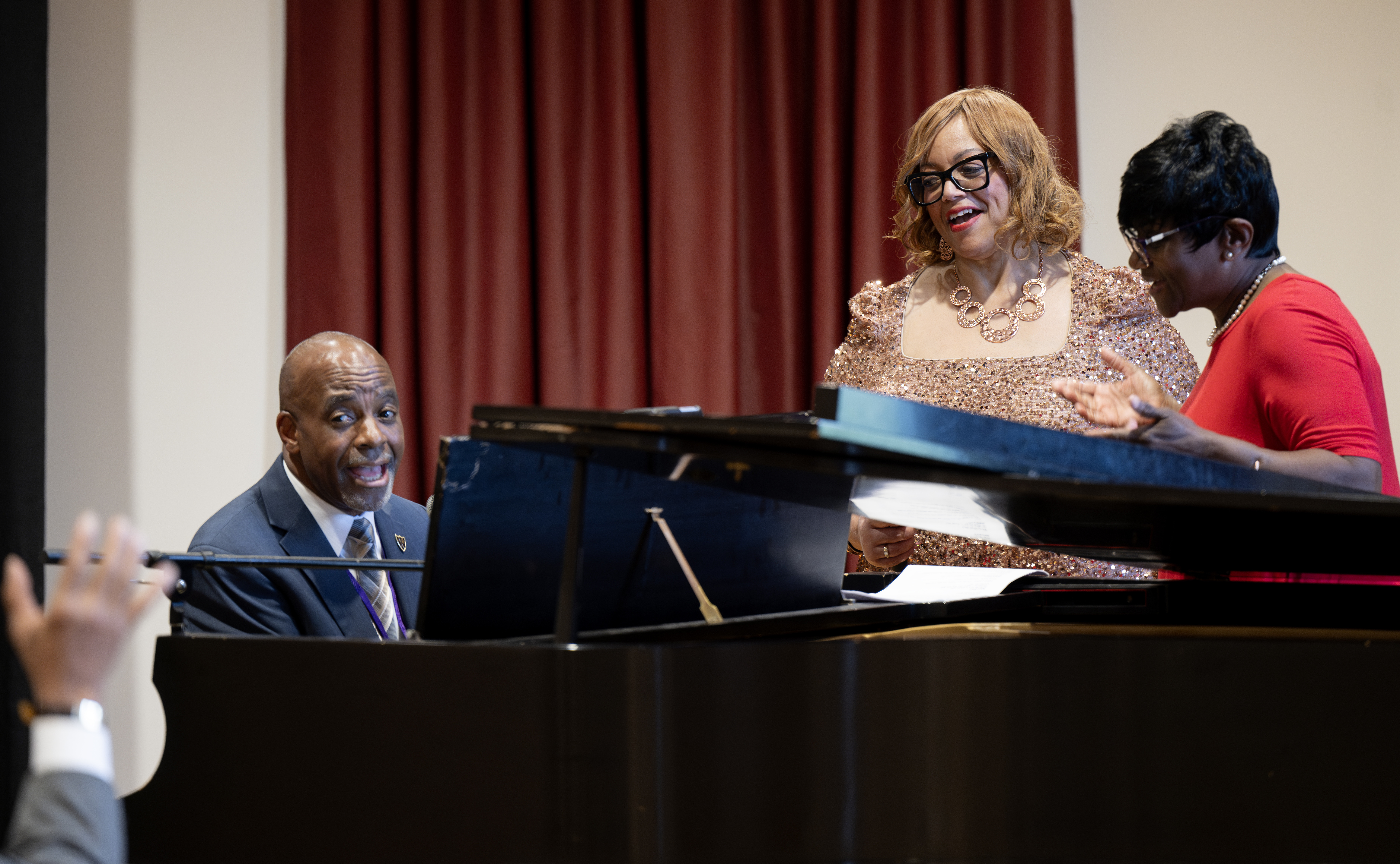 From left, alumni Larry Naylor, Carolyn Fuller Miller and Linda Hicks Burris perform during last year’s African American Alumni and Friends Reunion.