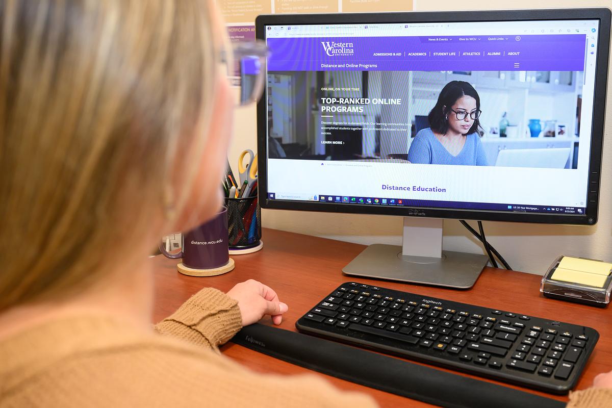 wcu online student working