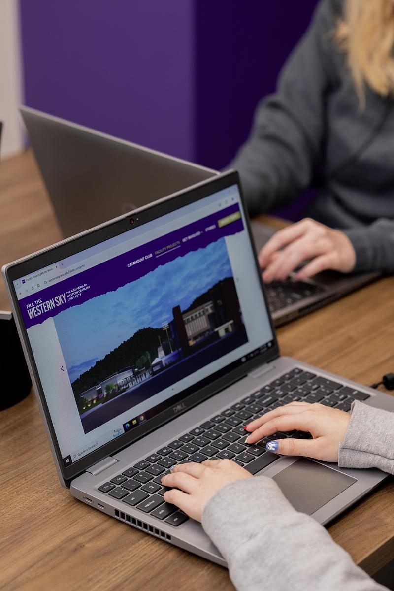 Student working on a laptop