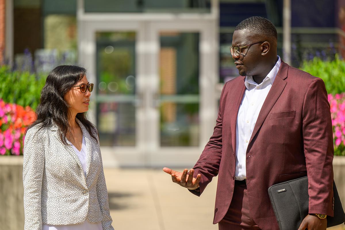 Student talks to professor