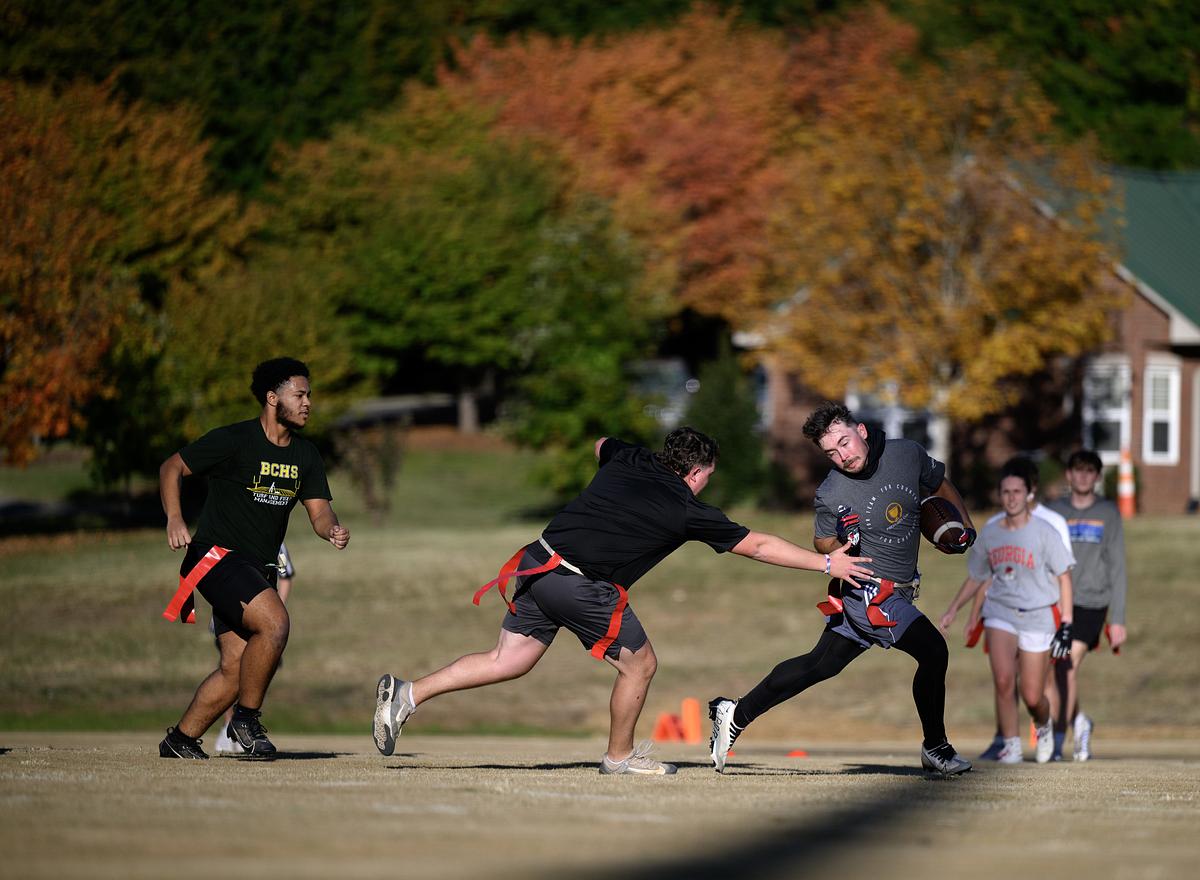 Students playing flag football