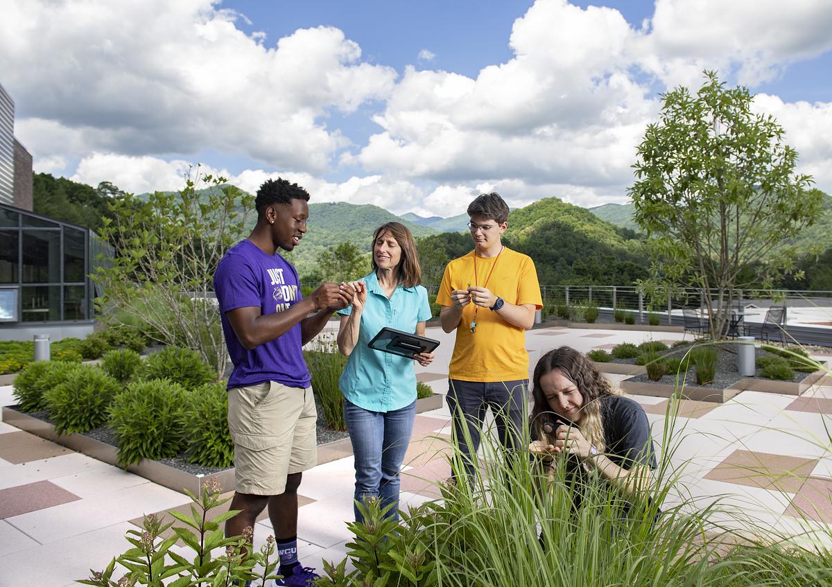 Picture of students in a group with "major and career exploration" written on the front