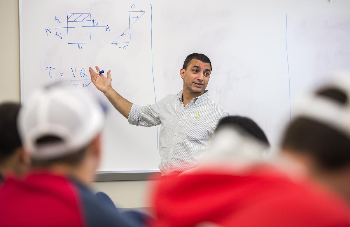 professor at whiteboard (decorative)