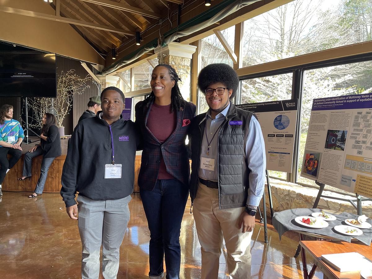 Call Me Mister students at a poster session