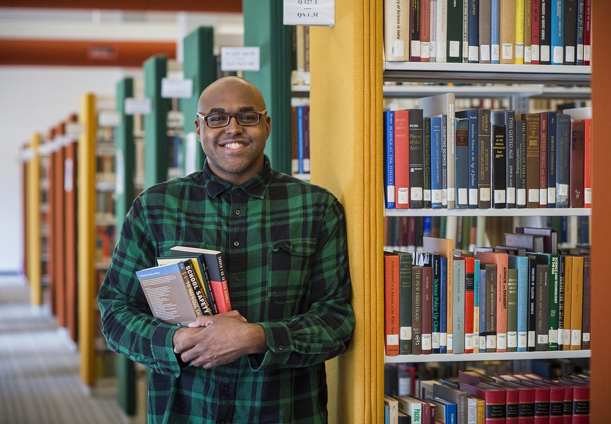 student in library (decorative)