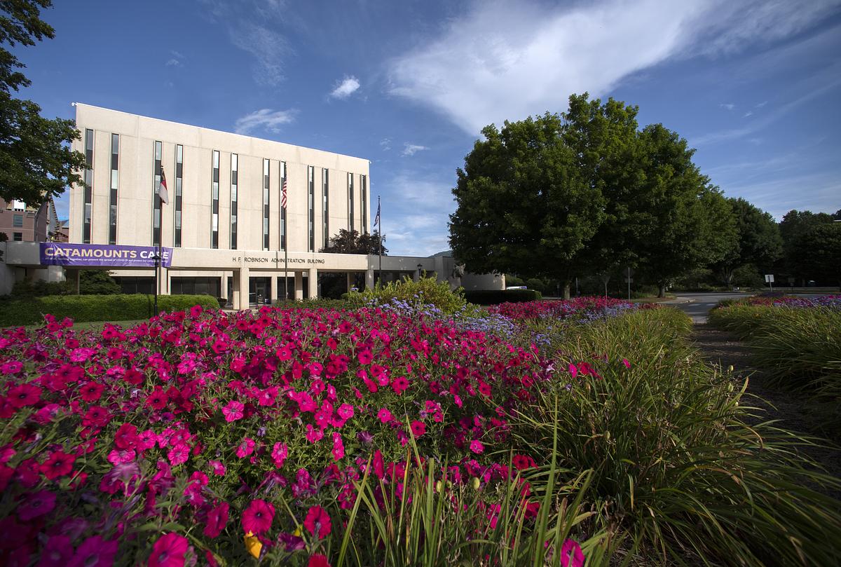HF Robinson building with spring flowers in the foreground