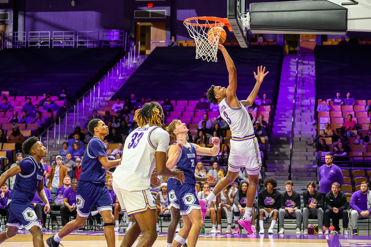 PAWS raises hands to stadium filled with students and encourages applause