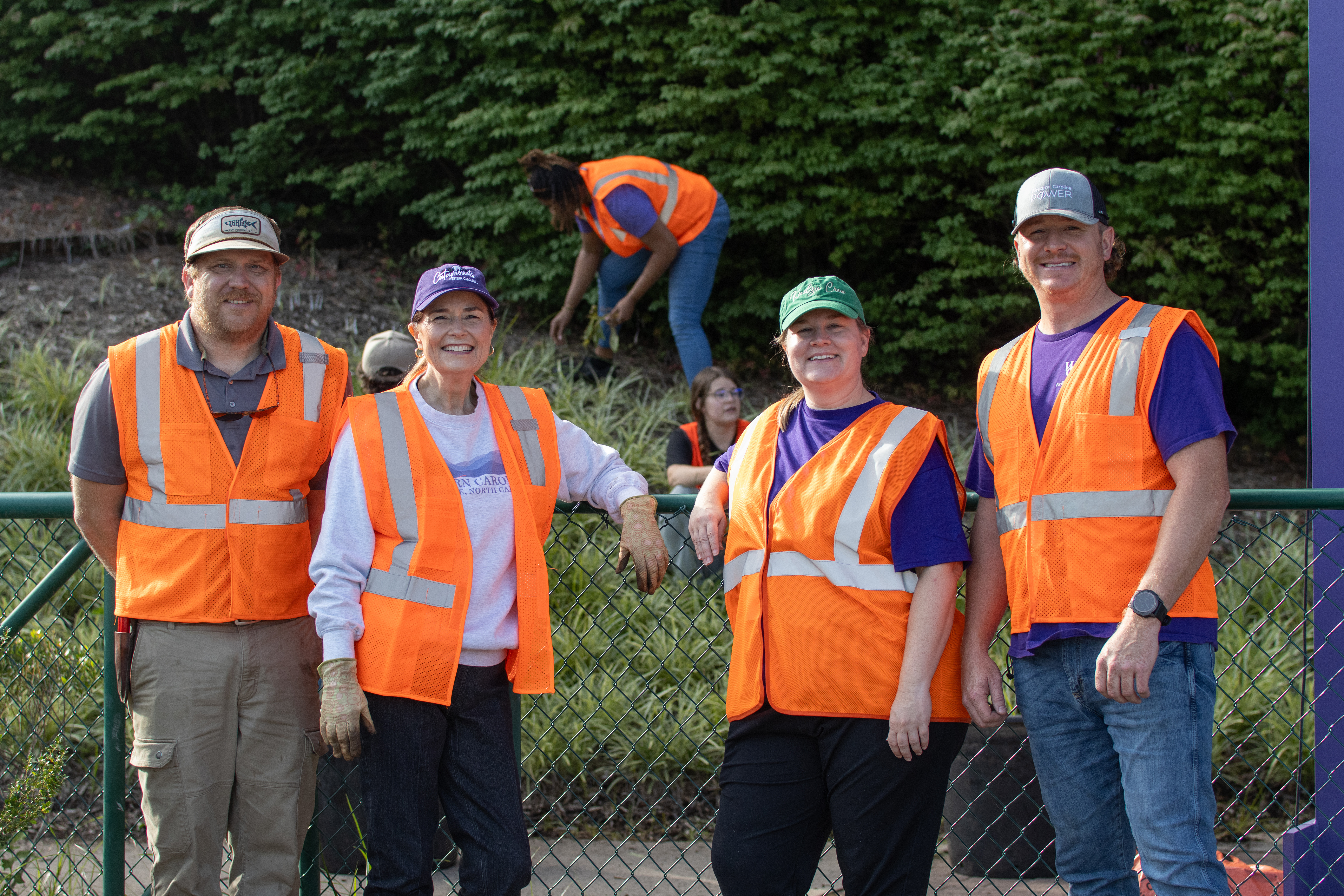 Catamount Blitz volunteers from left to right: Andy Pedonti, Chancellor Kelli R. Brown, Catherine MacCallum and Jason Turner