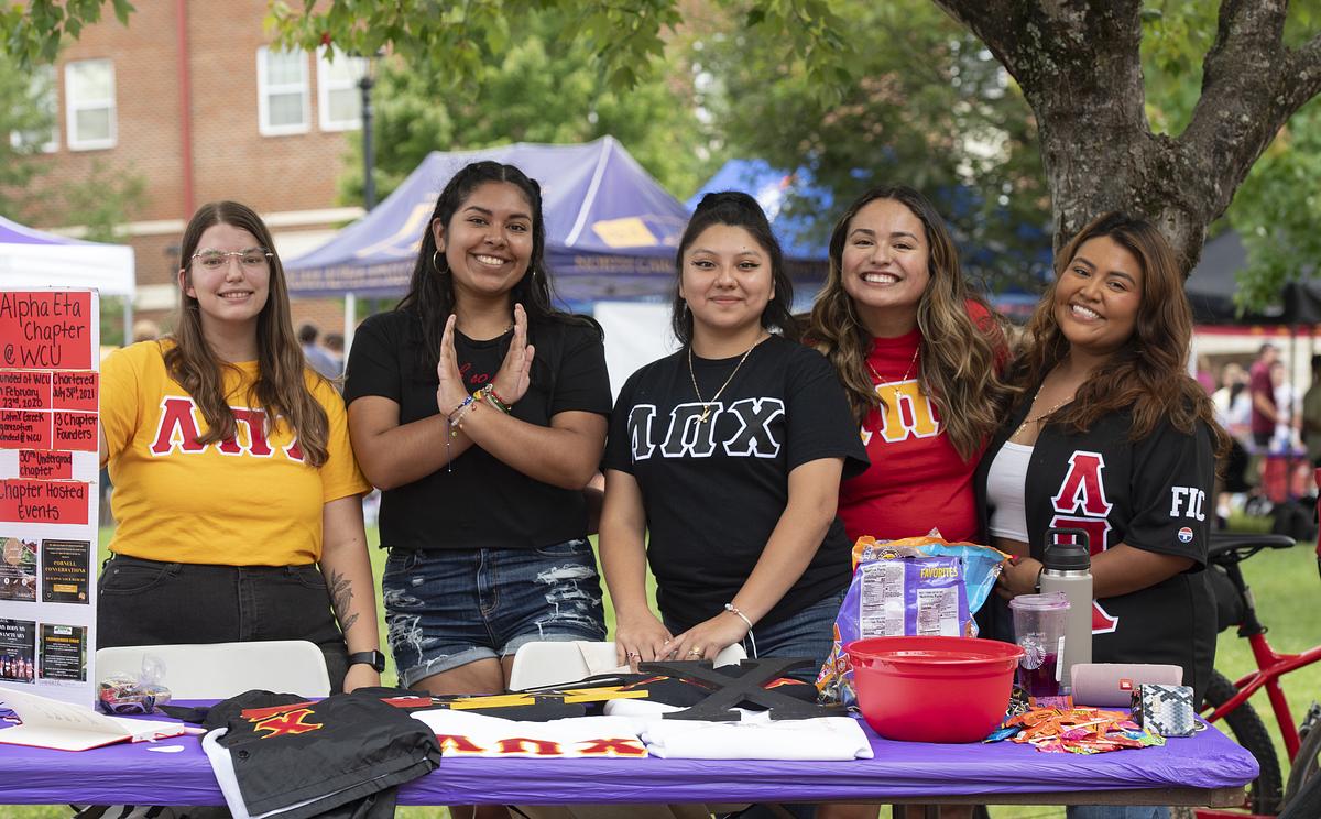 Greek students at a stand at the Valley Ballyhoo