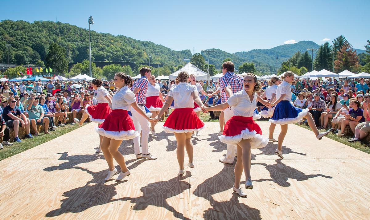 Dancers performing for an audience at the Mountain Heritage Festival