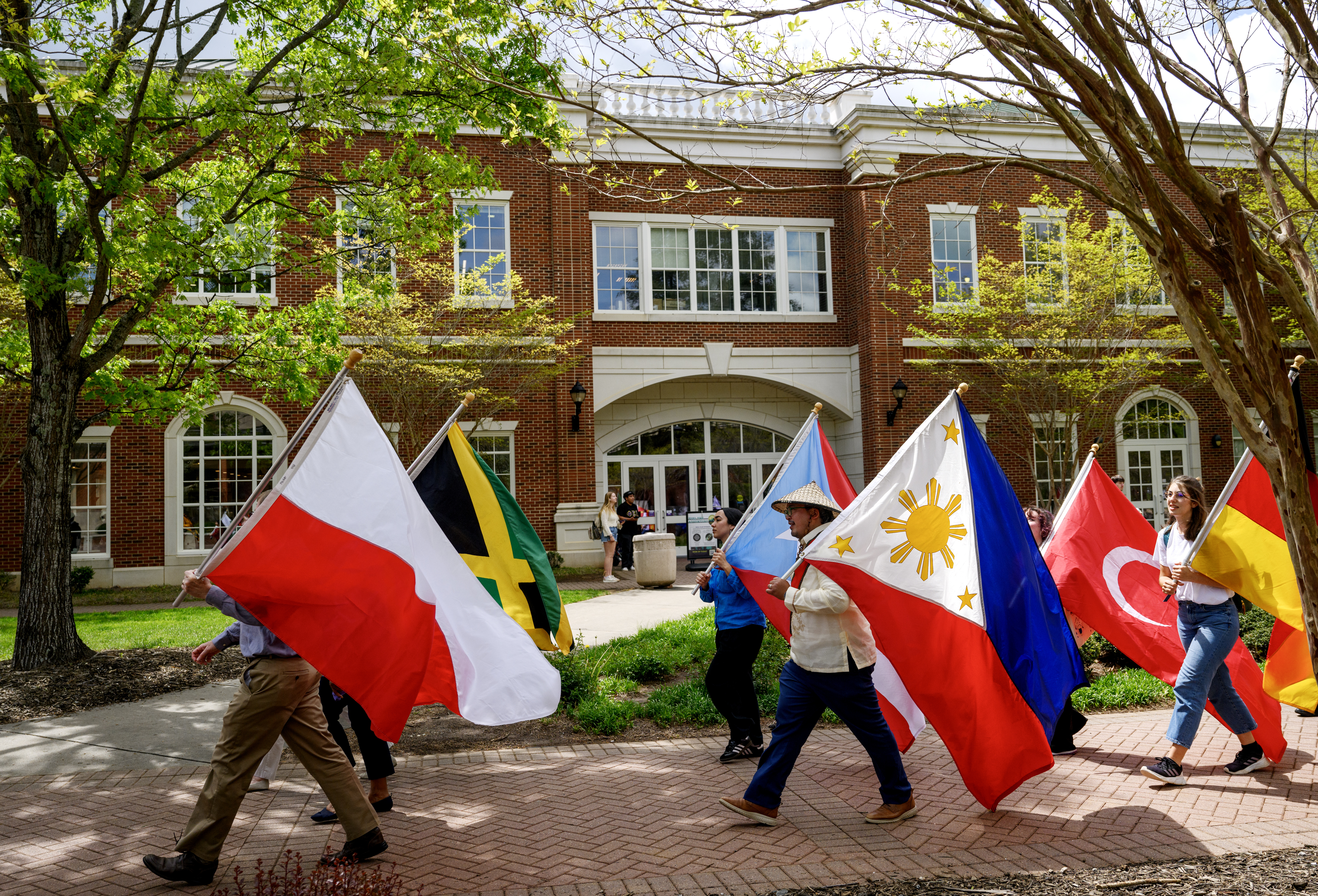 People walking on campus with frags from other countries