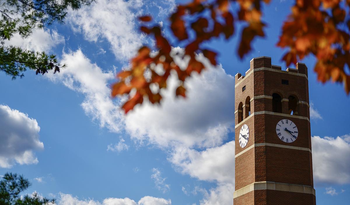 Photo of the alumni tower with fall foliage