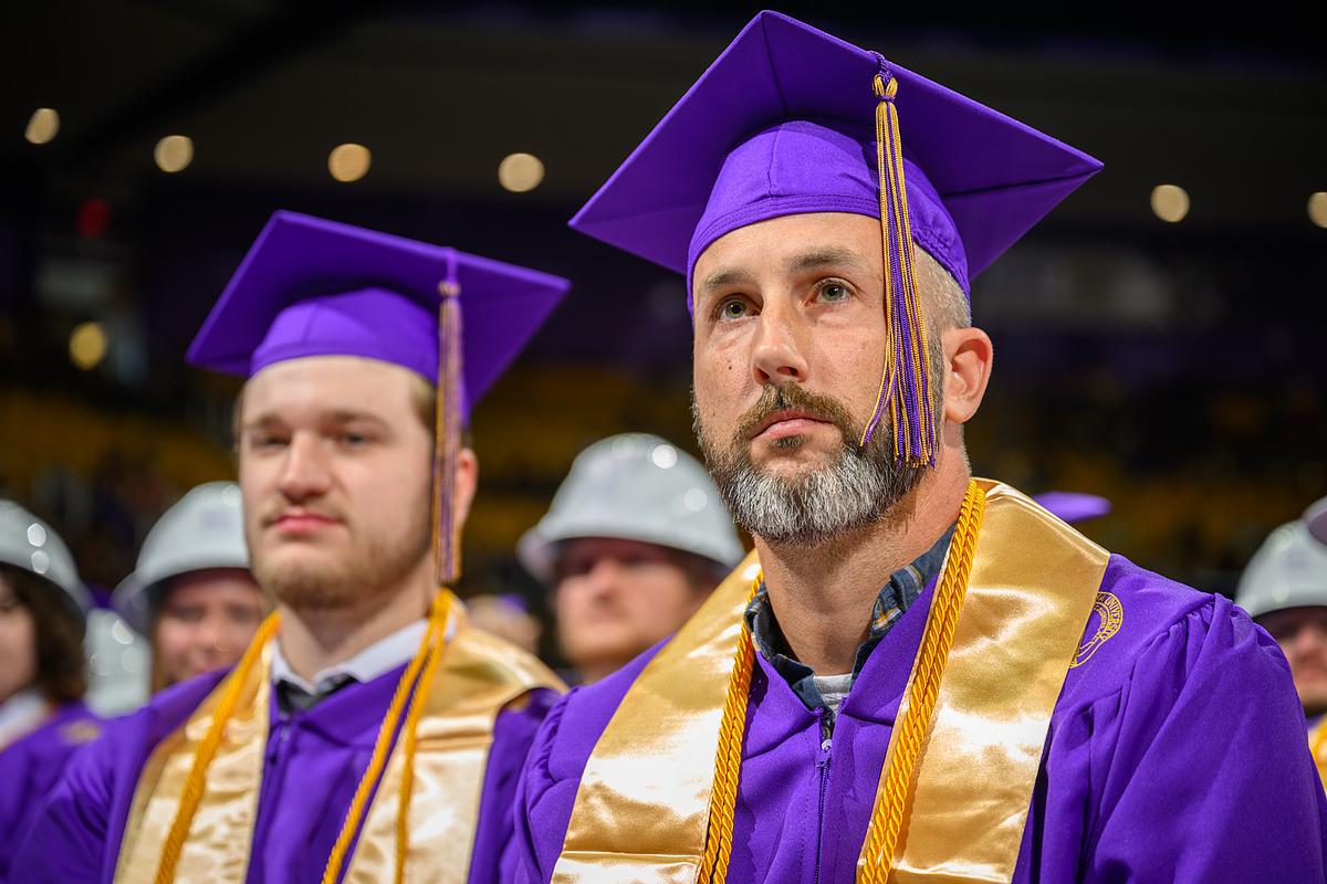 Two students at Commencement