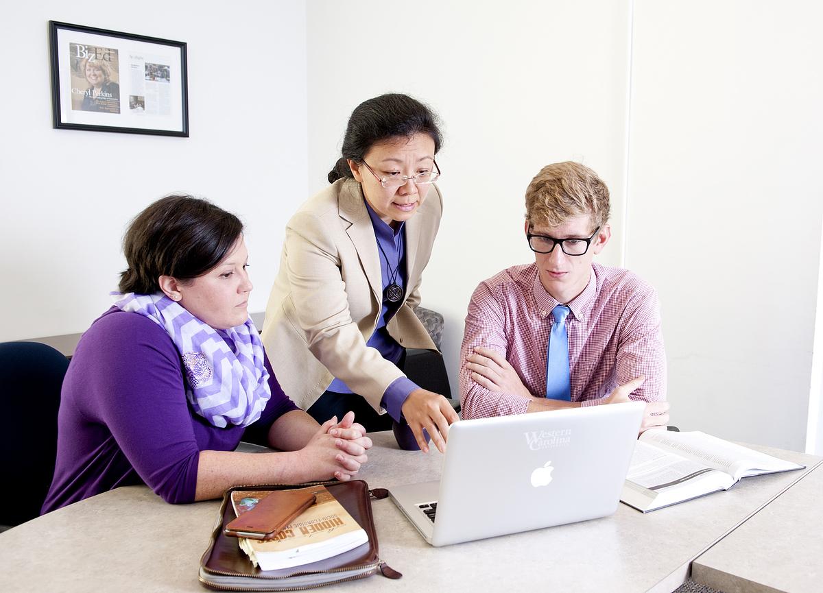 Student talking to professor
