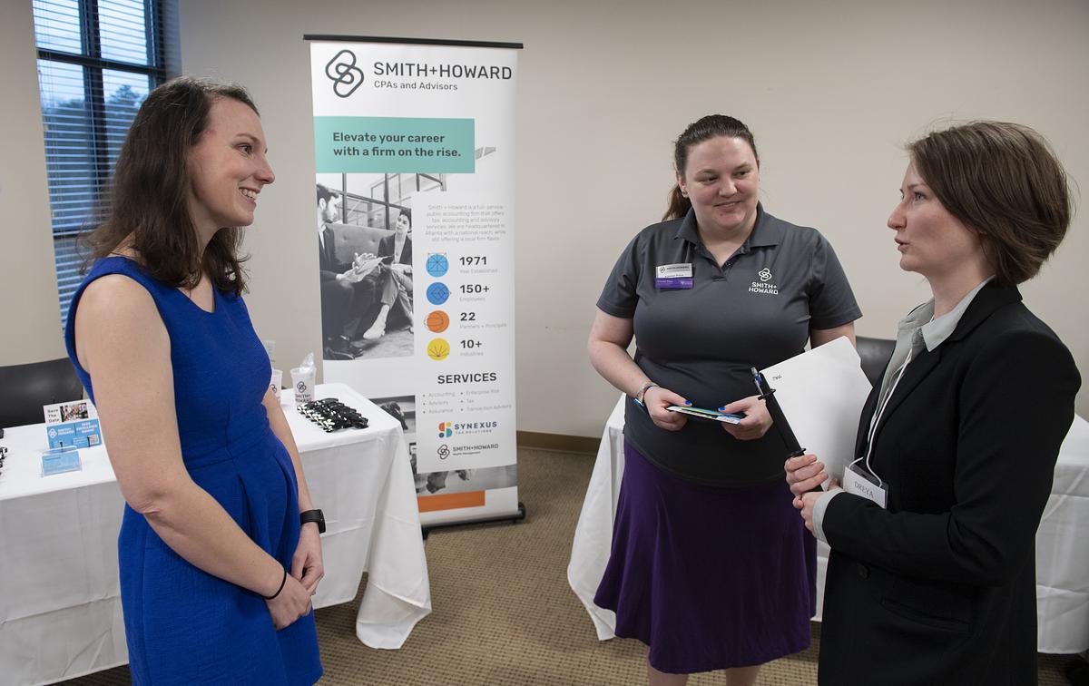 Potential clients meeting information holders at Meet the Firm