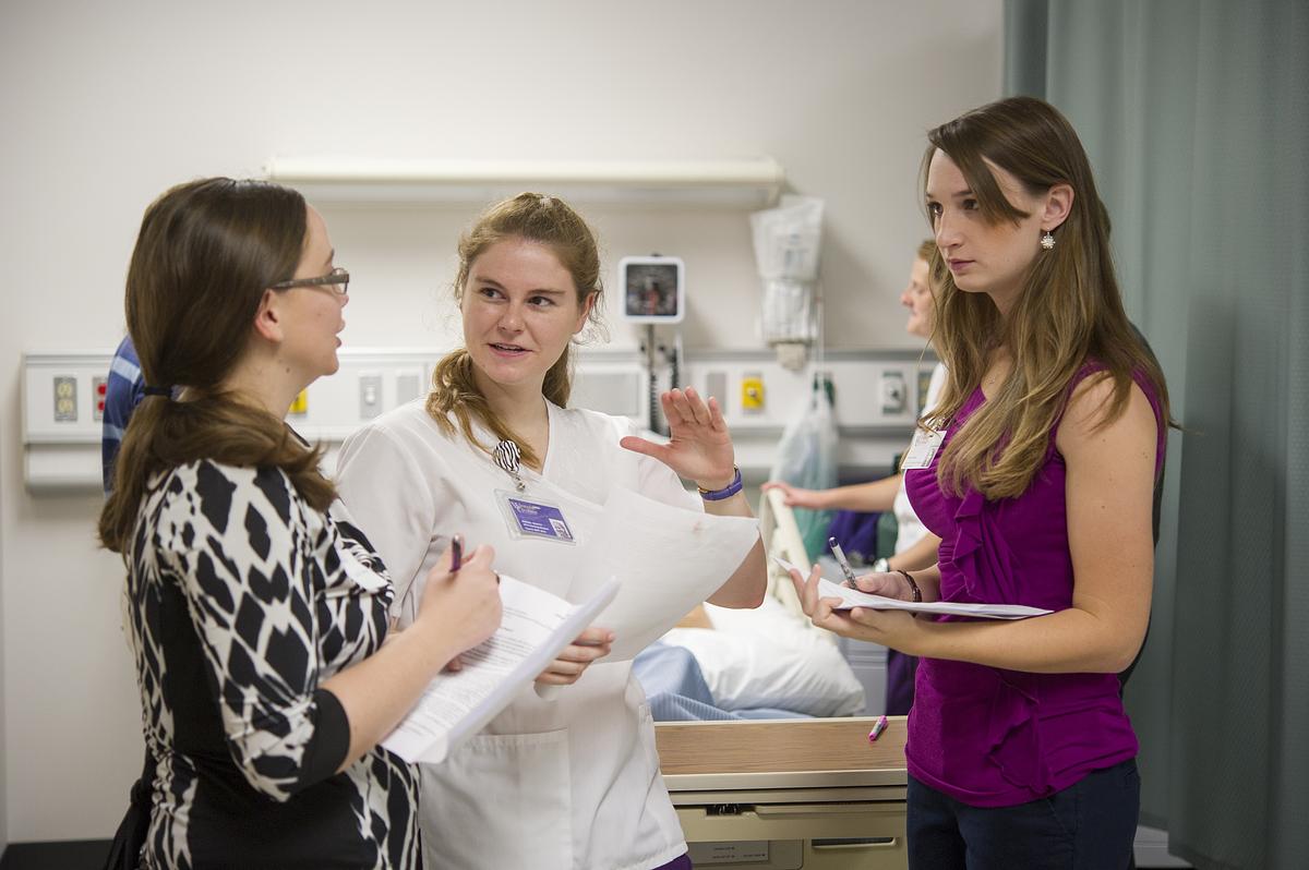 Nutrition dietetics practitioners talking in a hospital room