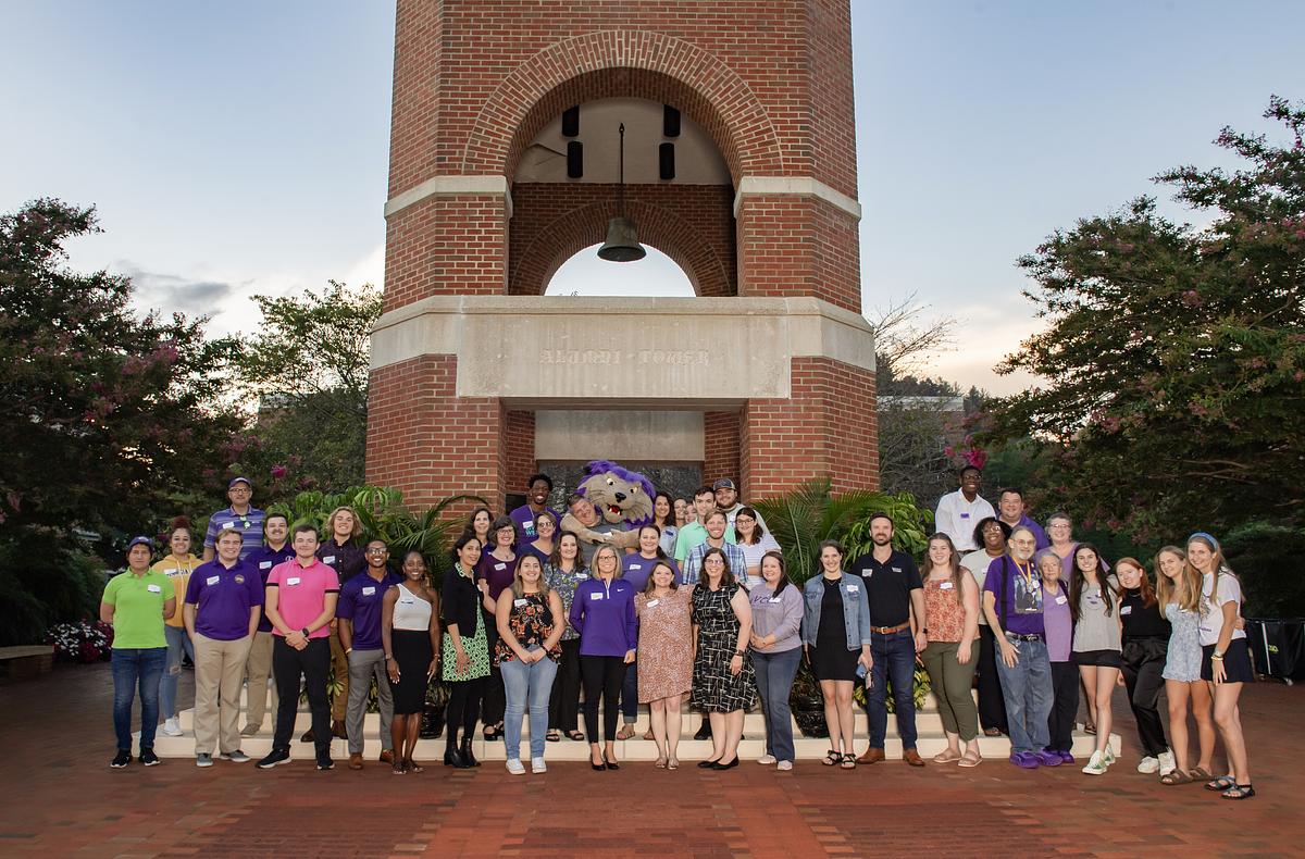 1889 Club Members in front of alumni tower