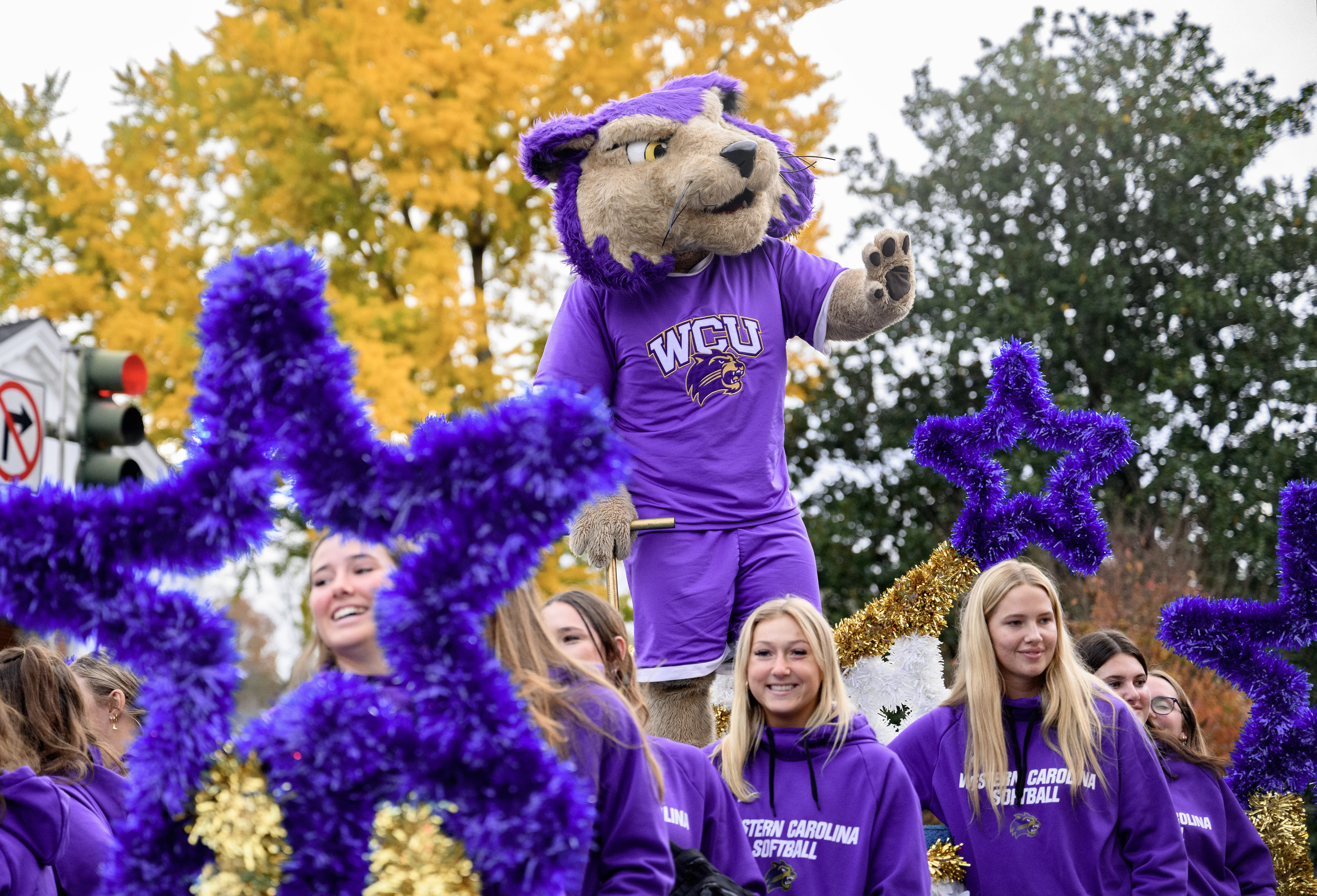 Paws rides on a float during the 2024 Homecoming parade in downtown Sylva