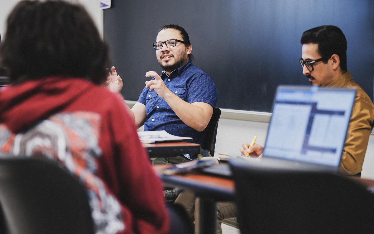 Students talking and debating in a class