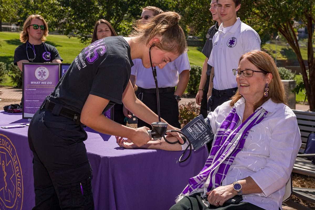 Chancellor Brown having her blood pressure taken at the Health and Wellness Fair