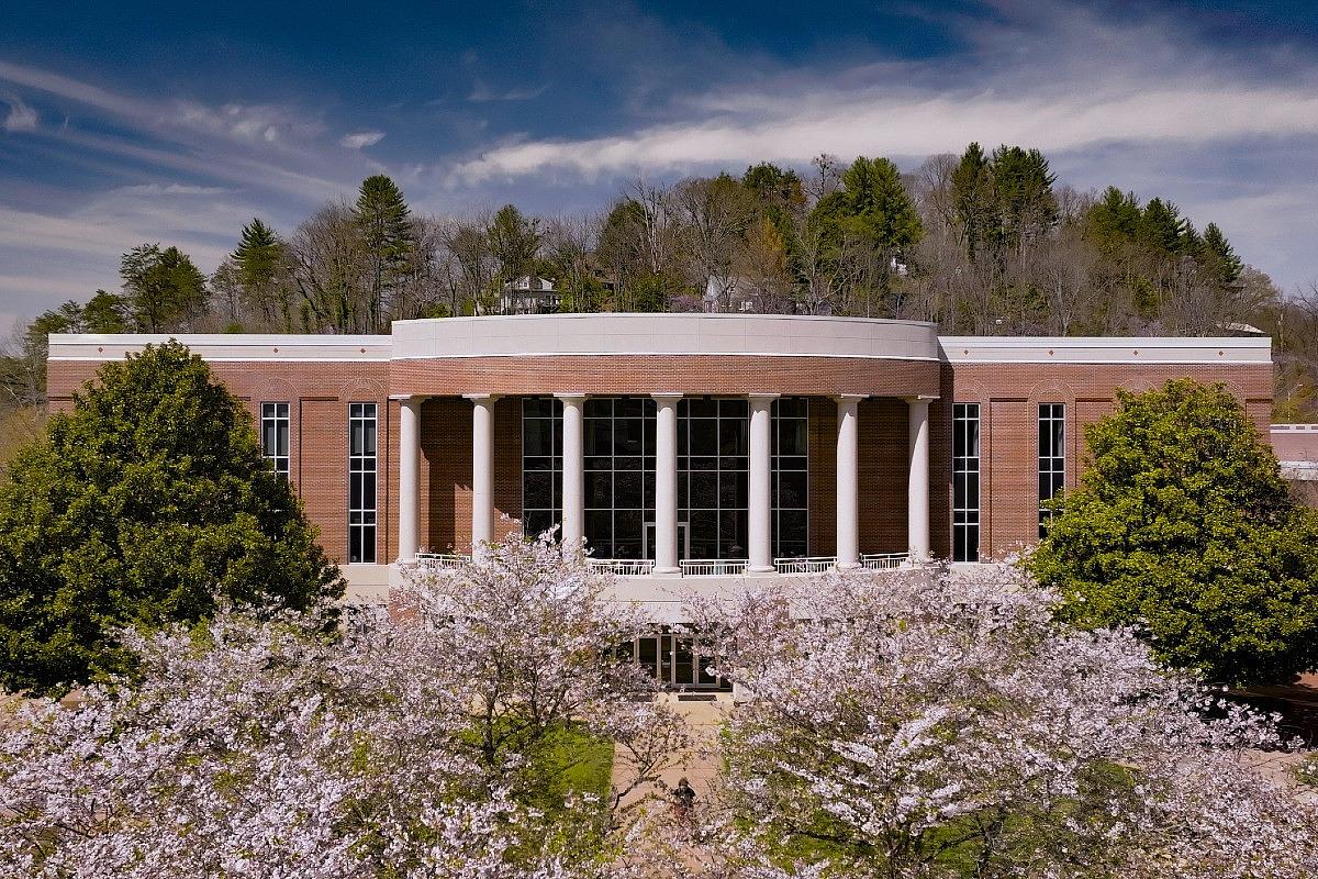 Aerial view of the UC building on campus in the spring