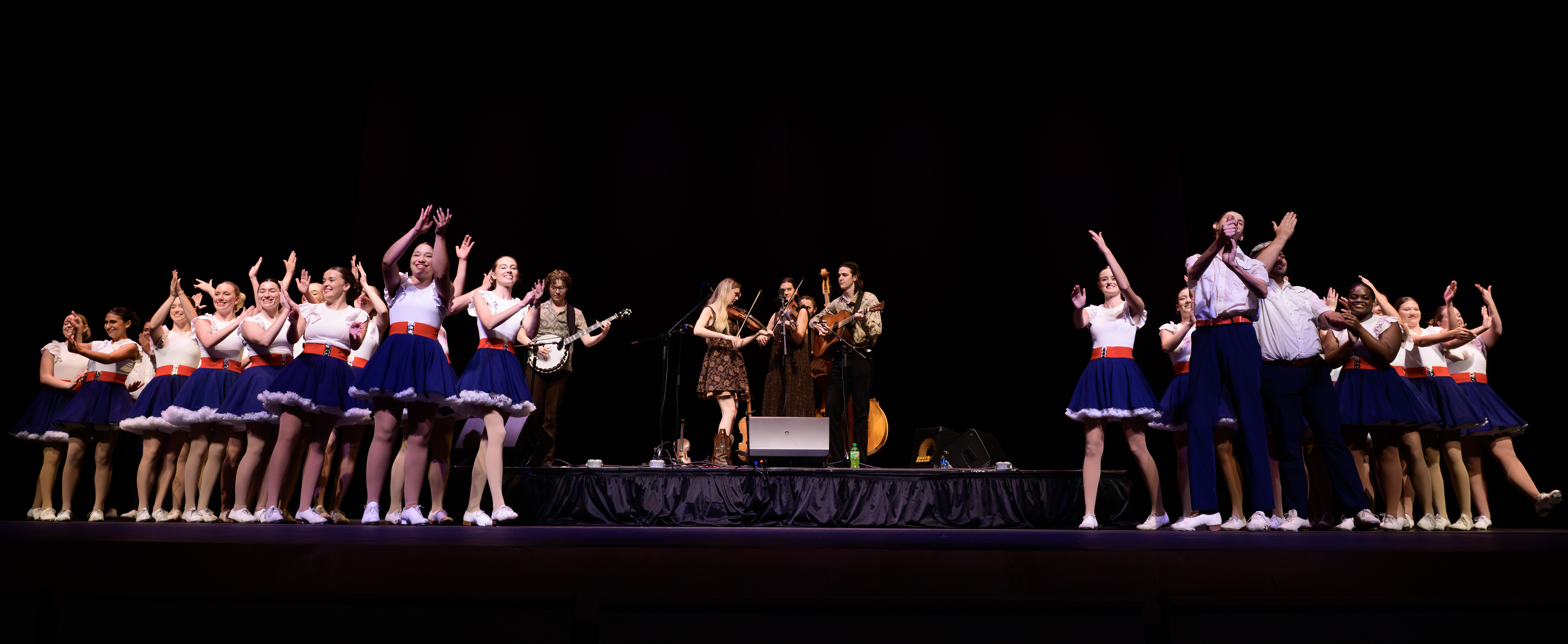 Cloggers and musicians on stage at Bardo Arts Center during Mountain Heritage Days