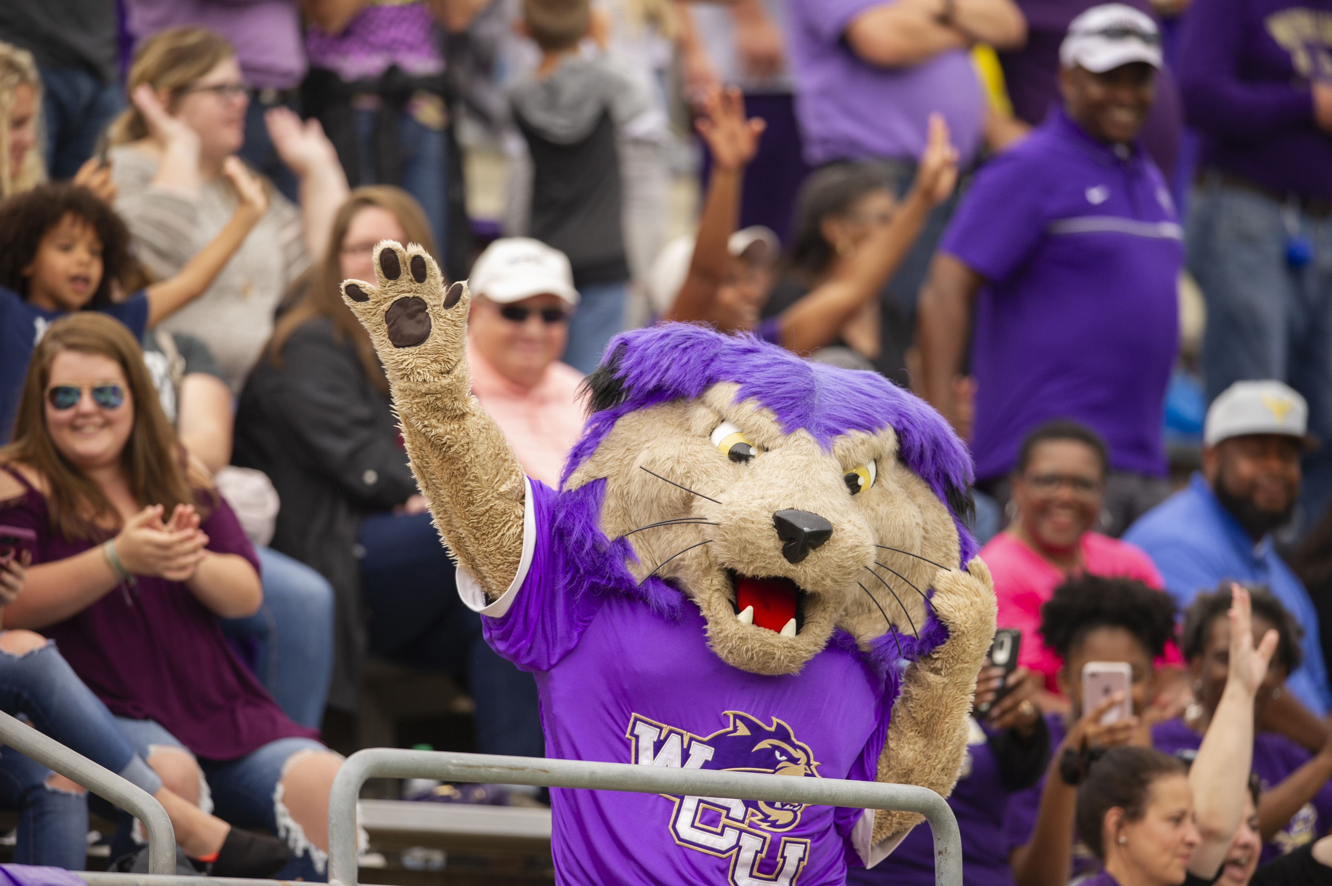 PAWS throwing his fist in the air with the crowd
