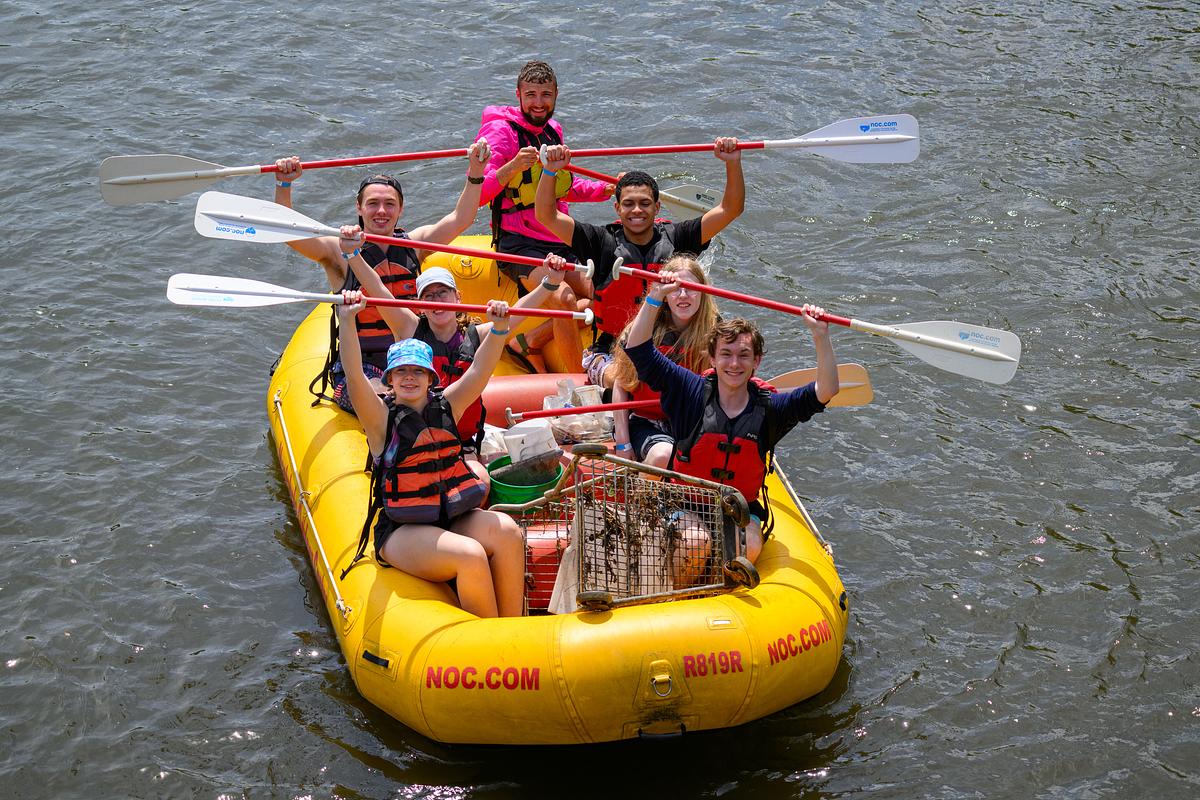 Students rafting at Tuck River Clean Up