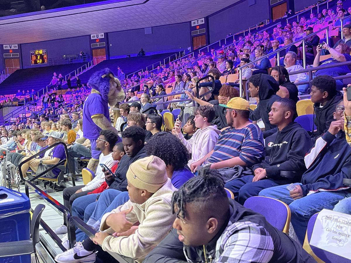 Call Me Mister students at a WCU basketball game
