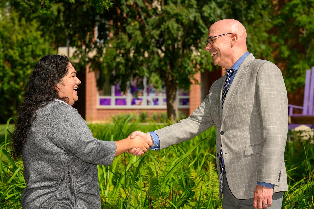 people shaking hands