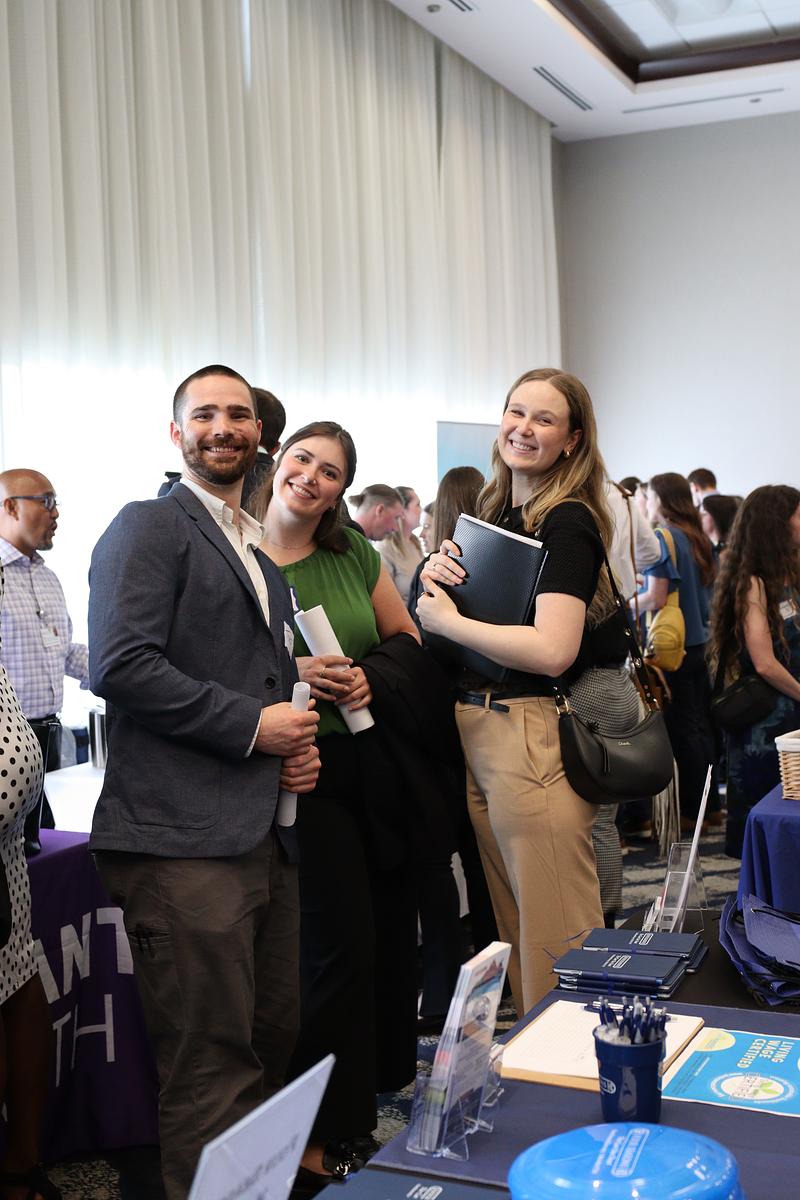 Picture of students in professional attire talking