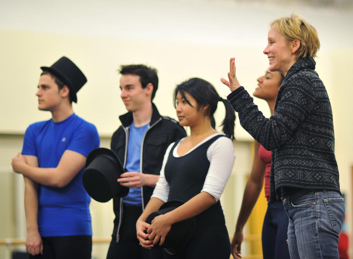 Faculty instructing students at a dance rehearsal