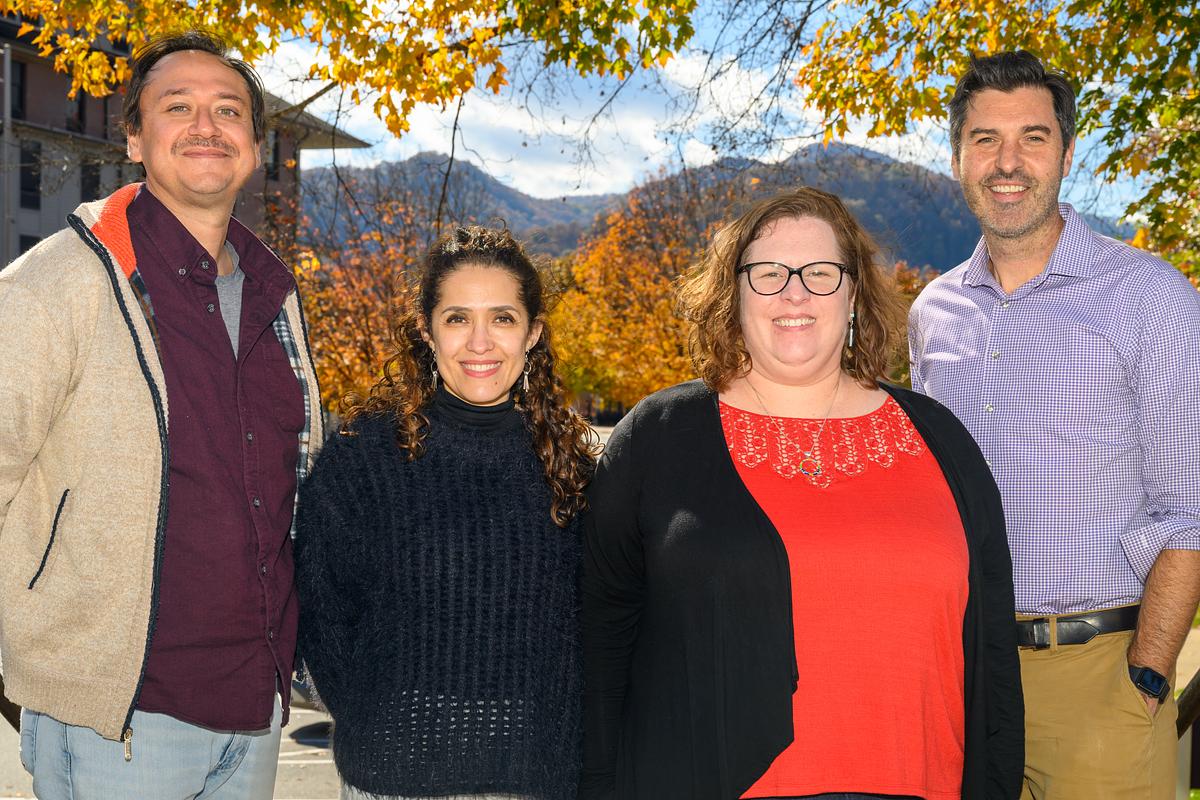 Spanish faculty smiling for a group photo