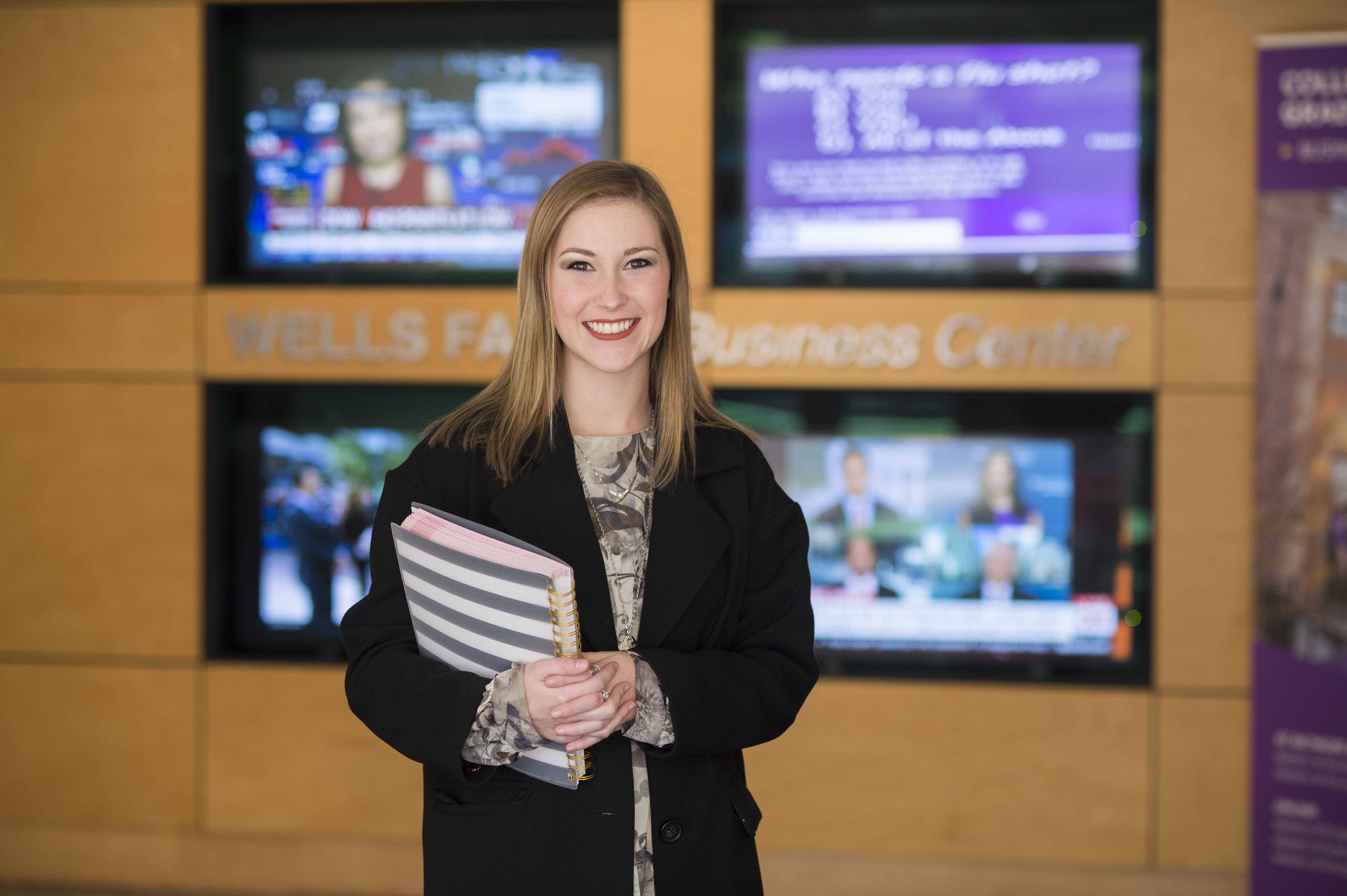 WCU student in lobby of Forsyth