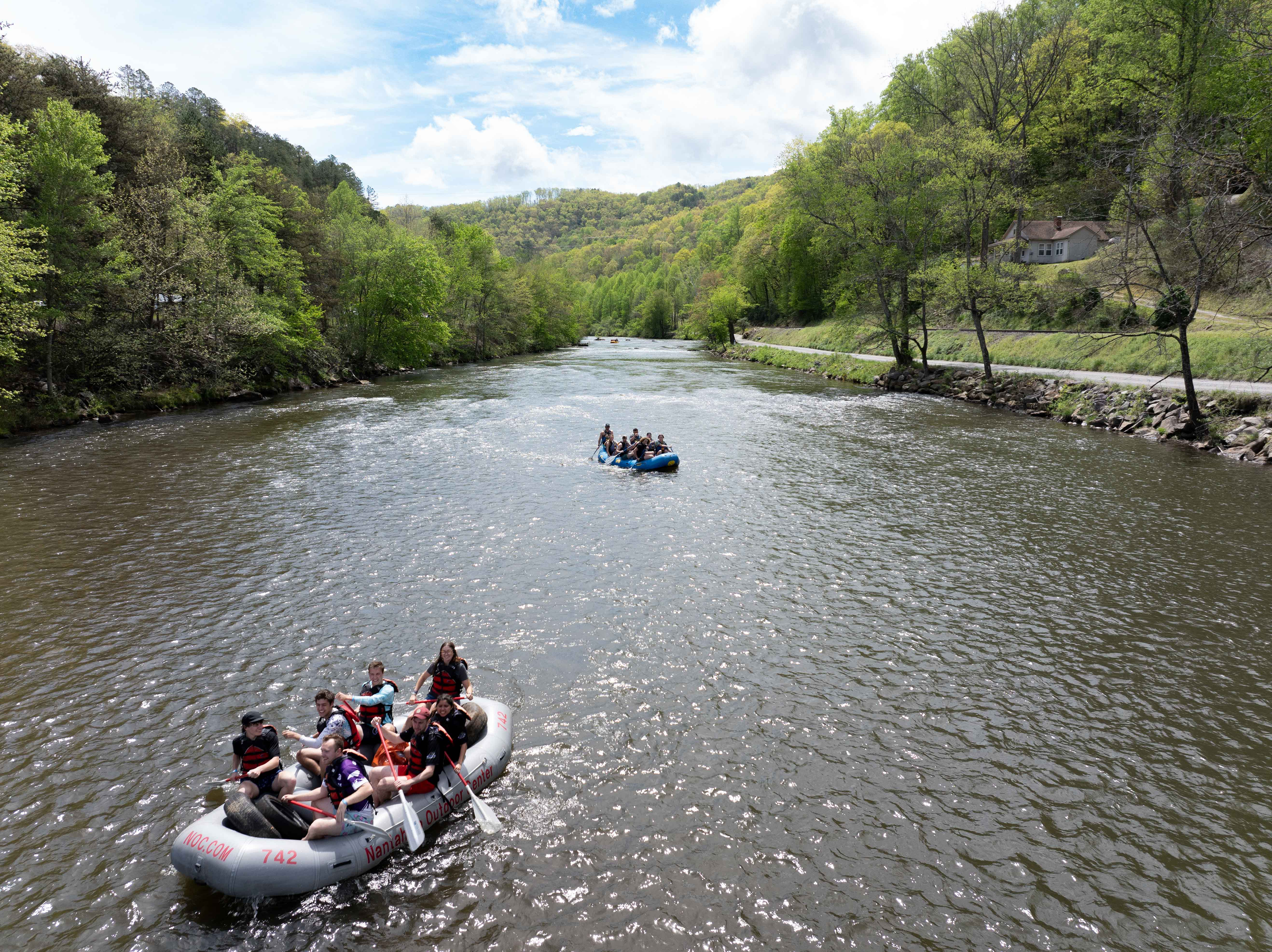 Rafters go down the Tuck River in Cullowhee