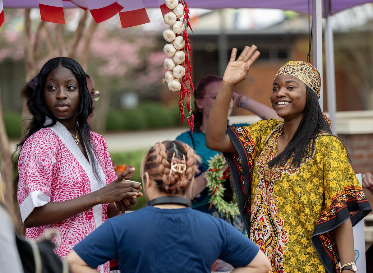 Students at a festival booth