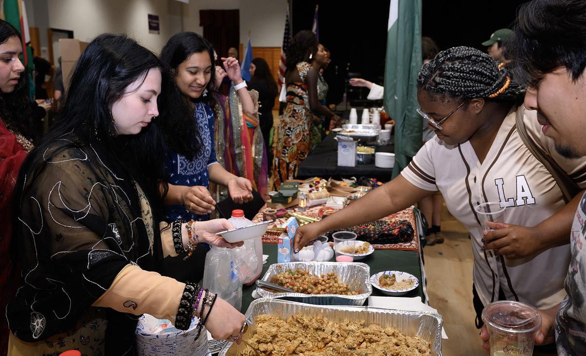Students at a lunch buffet line selecting what they want to eat
