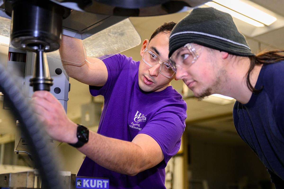 Students work in the machine shop
