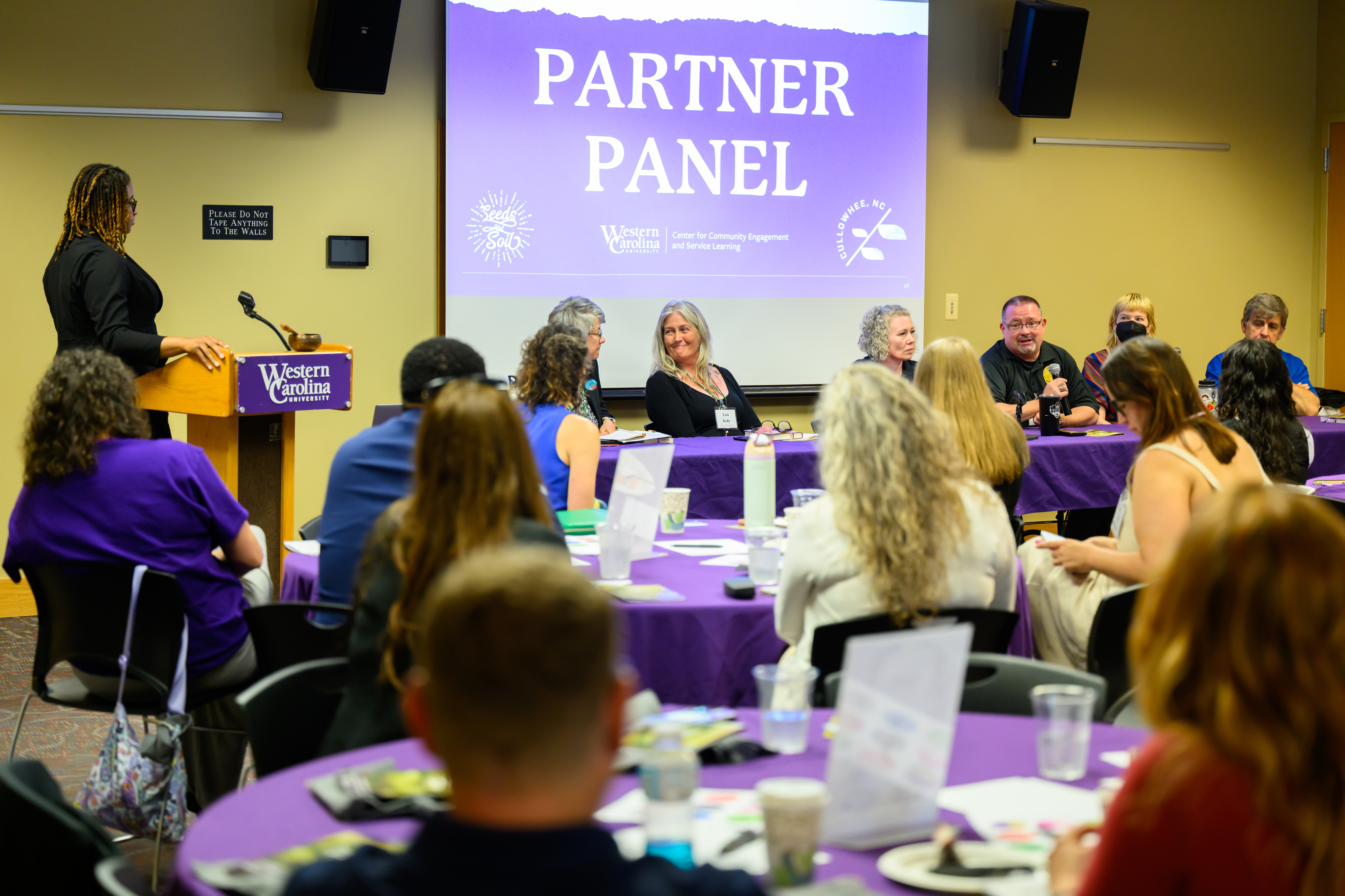 SLCP meeting with guest speakers and full audience attendance