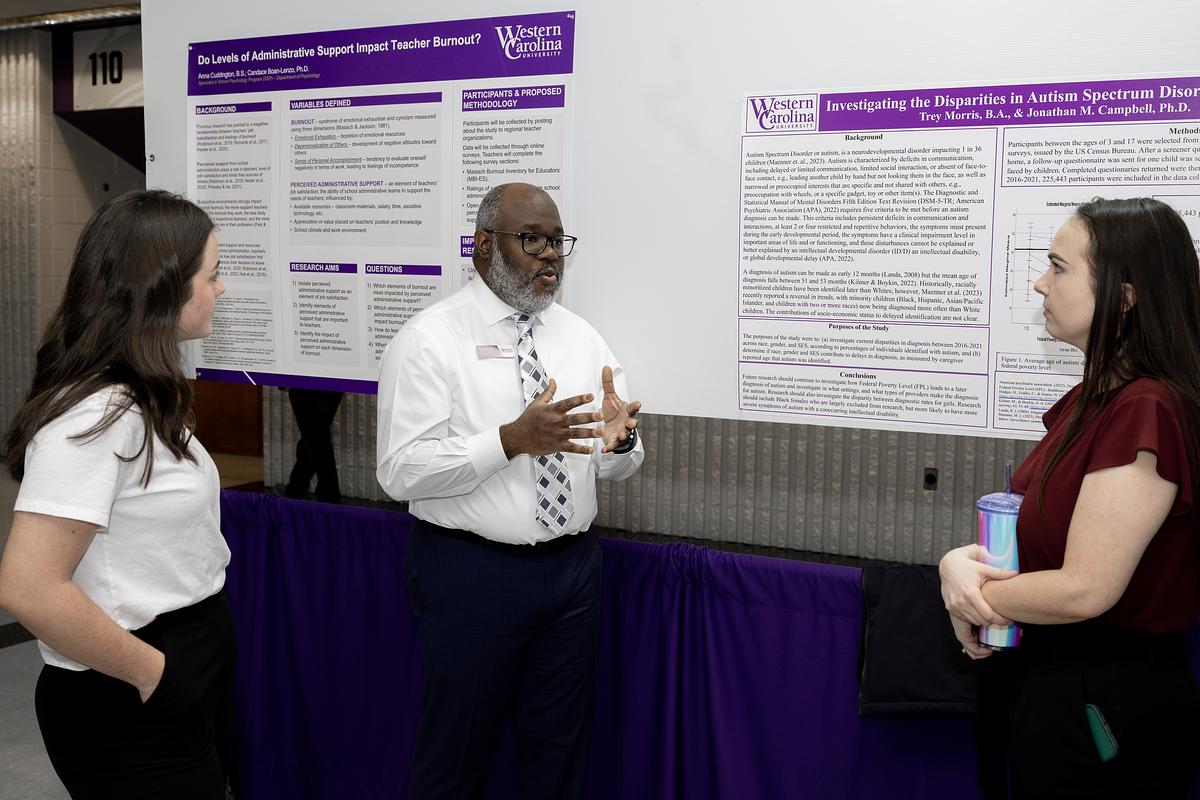 Professor talking with an audience at the RASC